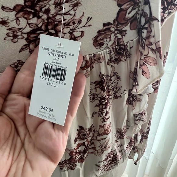 2 beautiful shirts. White shirt with bell sleeves the buckle shirt size small - Picture 7 of 9